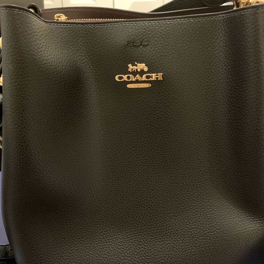 Brand new Coach black Bucket bag. Never use.